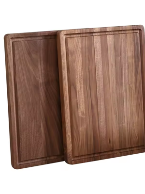 Reversible walnut cutting board with juice groove, front and back view