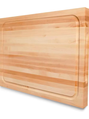 Large maple carving board with perimeter juice groove