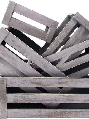 Distressed wooden nesting crates with cutout handles